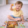 Baby playing with wooden puzzle